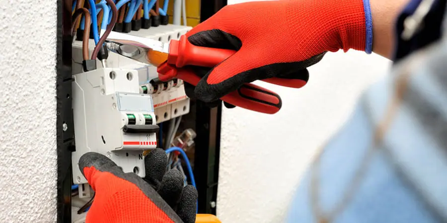 Technician working on electrical system